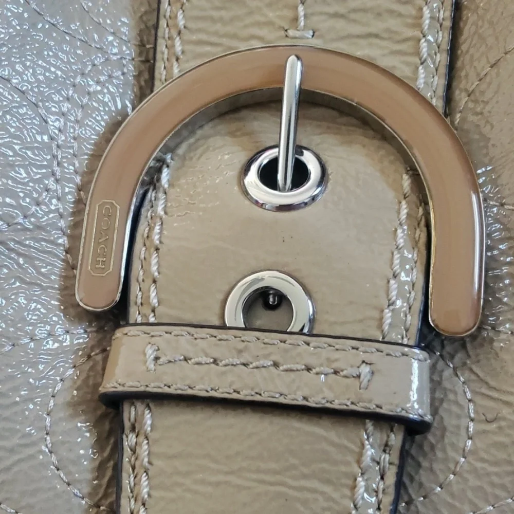 Coach Soho tan stitched satchel with buckle front accent